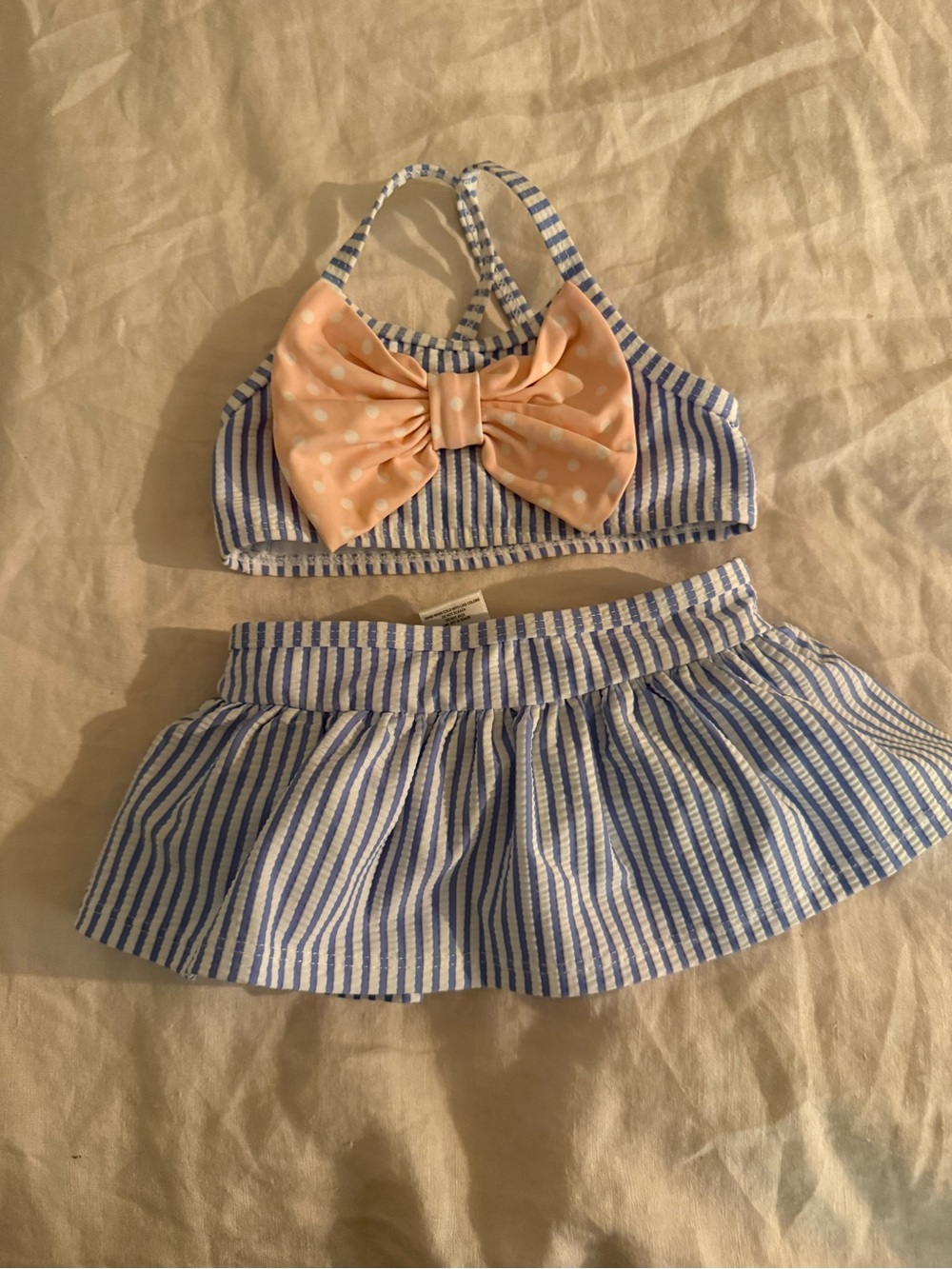 Ruffle Butts Blue & White Striped Swim Set with Peach Polka Dot Bow